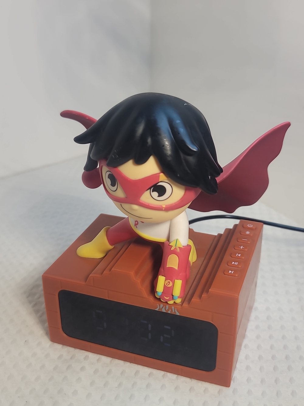 Red and Yellow Superhero Figure Alarm Clock Toy